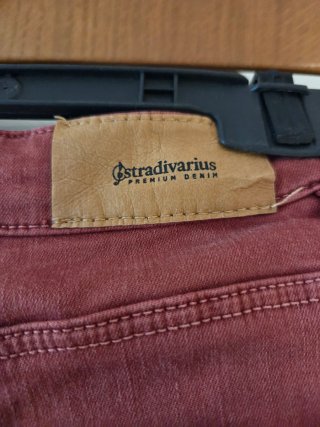 Pantalones vaqueros naranjas altos