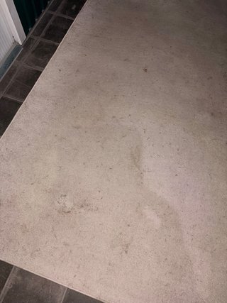 Alfombra gigante beige y negra