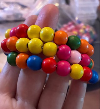 Bracciali rigidi perline legno multicolor