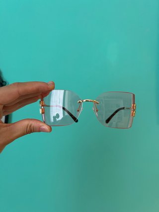Occhiali da sole Miu Miu rosa e oro