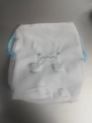 Bolsa pelúcia com cordão ajustável
