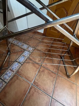 Tabla de planchar con tendedero