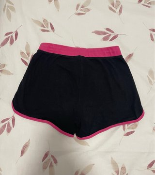 Pantalones cortos deportivos Domyos negros y rosas