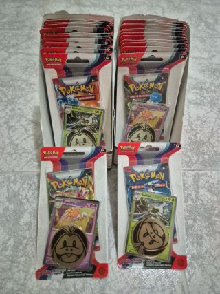 25 Blister packs Pokémon con Moneda y Carta Promo