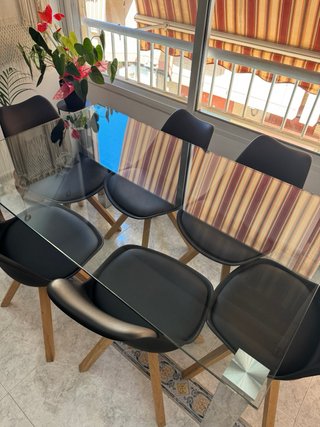 Mesa de comedor cristal con patas de espejo