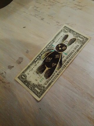 Banconota da 1 dollaro USA con disegno coniglio