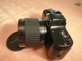 Camara Pentax 110 con  Zoom 20-40mm