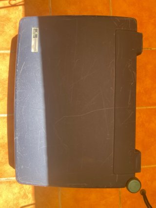 Maleta de viaje azul con ruedas