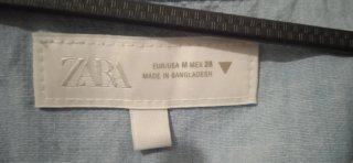 Camisa Zara azul con volantes vaquera