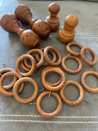 Apliques y argollas para cortinas de madera