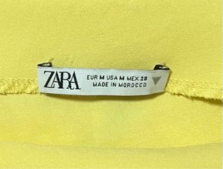 Top asimétrico amarillo