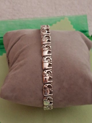 Pulsera de elefantes plateada
