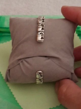 Pulsera de elefantes plateada