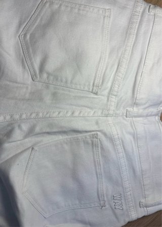 Pantalones acampanados blancos