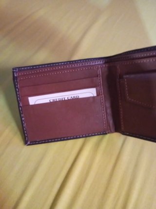 Cartera de caballero piel marrón.