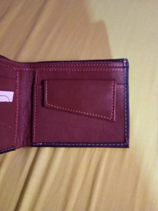 Cartera de caballero piel marrón.