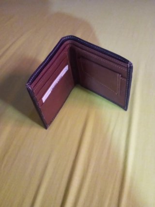 Cartera de caballero piel marrón.