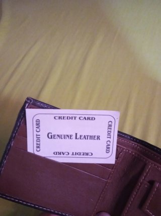 Cartera de caballero piel marrón.