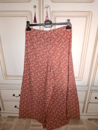 Pantalón ancho estampado naranja y blanco