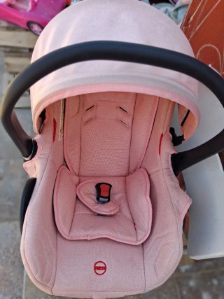 Carro de bebé rosa