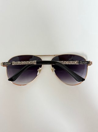Gafas de sol Cartier Aviador Dorado y Negro