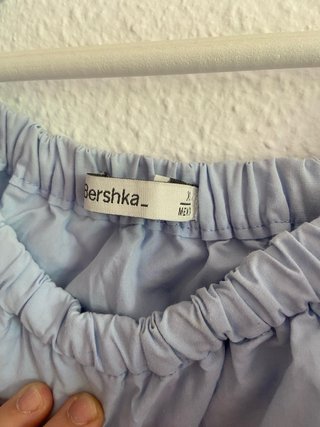 Camisa azul de volantes