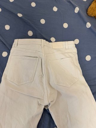 Pantalones blancos acampanados