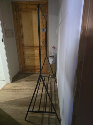 Burra para ropa negra en su caja