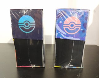 2 Cajas Entrenador Élite Pokémon: Fuegos Fantasmal