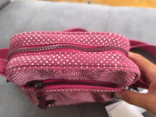 Bolso bandolera Tous rosa lunares