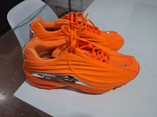Nike NOCTA Naranja y Plata