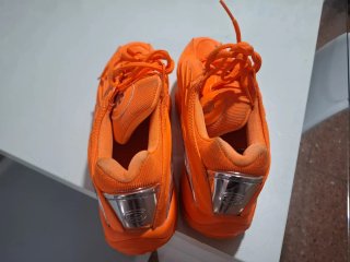 Nike NOCTA Naranja y Plata