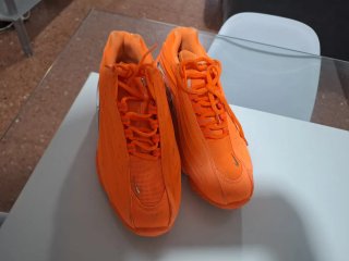 Nike NOCTA Naranja y Plata