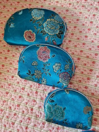 Monederos Matrioska azules y rosas