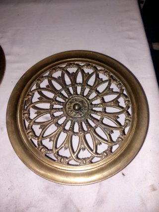 Mirilla antigua de bronce