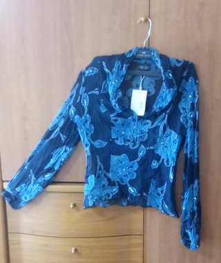 Conjunto chaquea y Falda midi floral