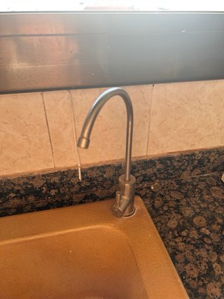Cocina completa de madera y piedra