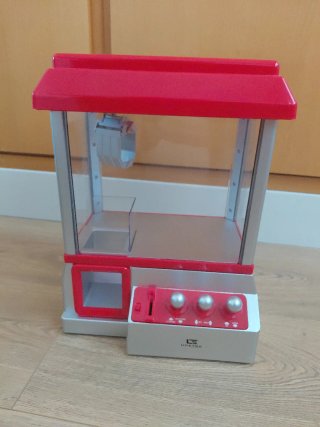 Máquina de gancho de juguete United