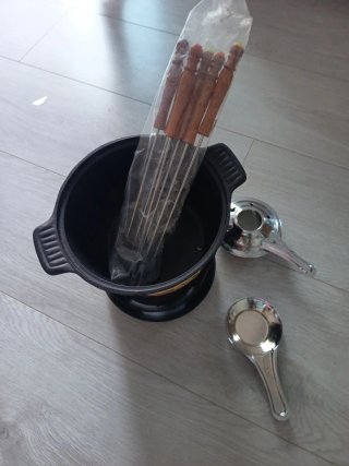 Fondue de hierro fundido sin usar