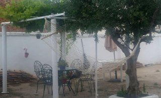 Hamaca de red grande con barras de madera