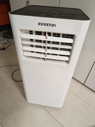 Aire acondic portátil Infiniton 10000 BTU con kits