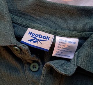 Polo verde Reebok