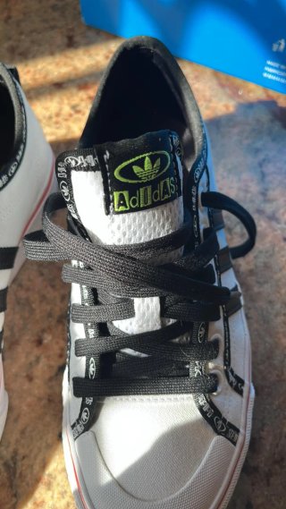 Zapatillas Adidas Nizza Blancas y Negras