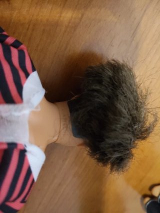 Lote de 5 Muñecos Ken y ropa.