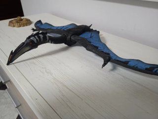 Figura Dinosaurio Quetzalcoatlus con huevos