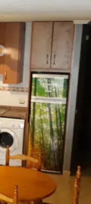 Frigorífico con diseño de bosque