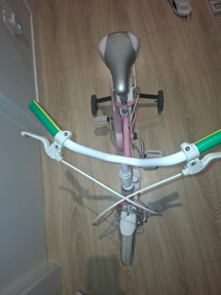 Bicicleta niña 14 rosa con ruedines
