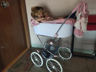 Cochecito de muñecas rosa