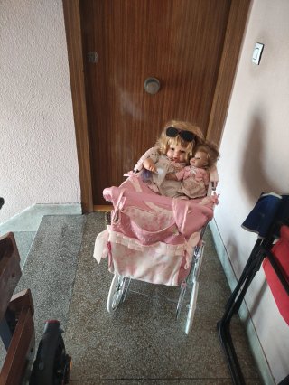 Cochecito de muñecas rosa