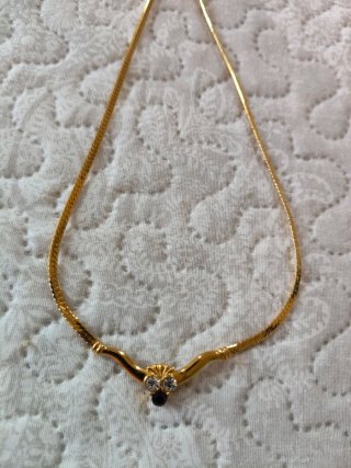 Gargantilla vintage oro y negro